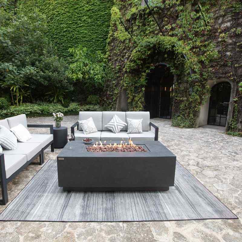 Elementi Andes Fire Table with flame and couches Backyard set Up